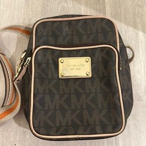 Michael Kors Satchel. Has some wear on the outside as shown in pictures.
